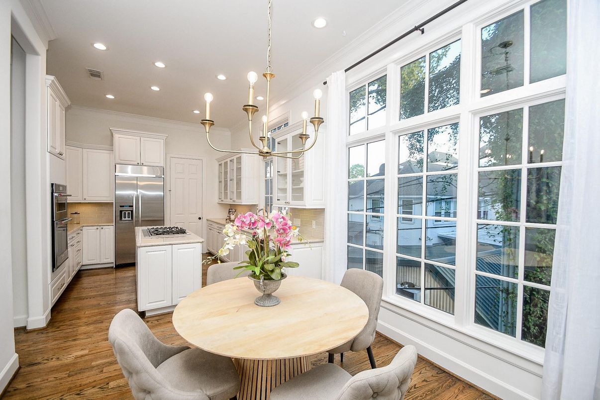 Chandelier, Dining room, Interior, Kitchen, Pendant Lights, Recessed Lighting, Stainless Steel Appliances, Wood Texture Flooring