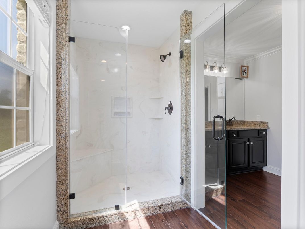 Bathroom, Glass Shower, Interior, Marble Walls, Recessed Lighting, Wood Texture Flooring