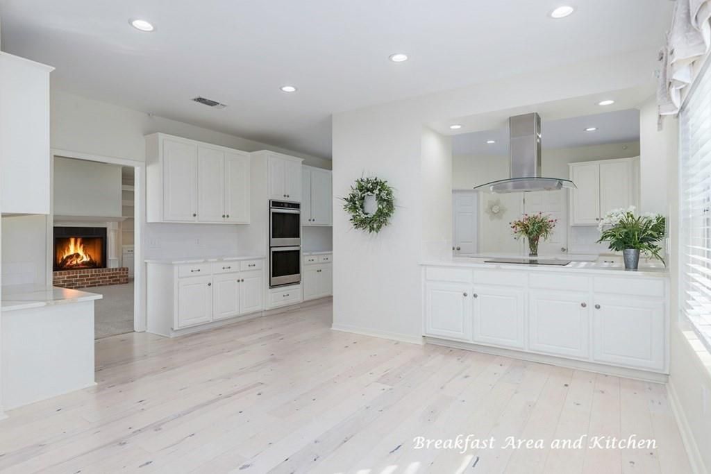 Fireplace, Interior, Kitchen, Recessed Lighting, Stainless Steel Appliances, Wood Texture Flooring