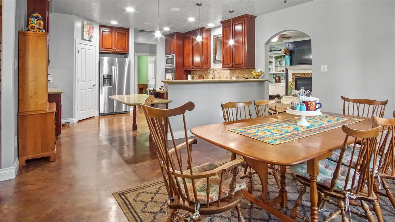Dining room, Fireplace, Interior, Kitchen, Pendant Lights, Recessed Lighting, Stainless Steel Appliances
