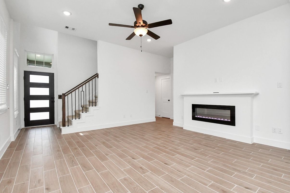 Empty room, Fireplace, Interior, Recessed Lighting, Wood Texture Flooring