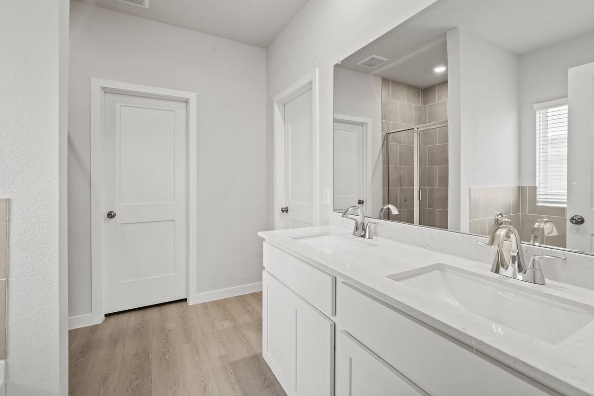 Bathroom, Dual Sink Vanities, Interior, Recessed Lighting, Wood Texture Flooring
