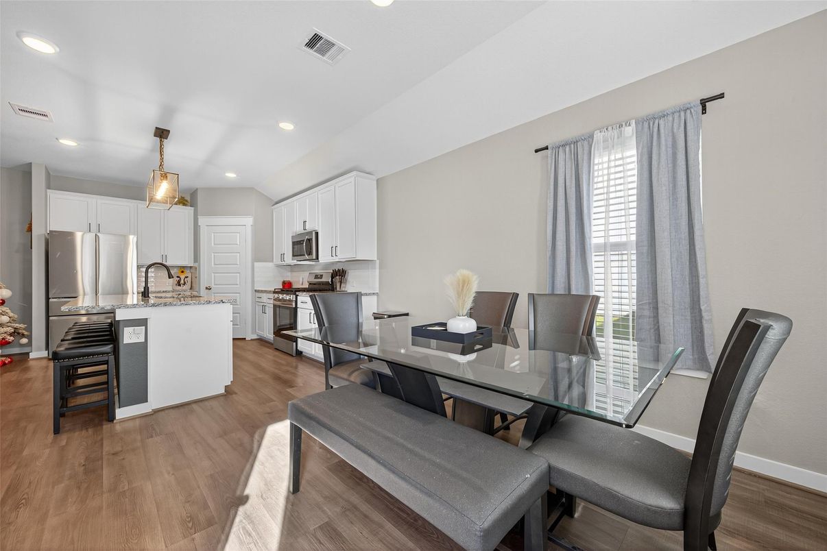 Dining room, Interior, Kitchen, Pendant Lights, Recessed Lighting, Stainless Steel Appliances, Wood Texture Flooring