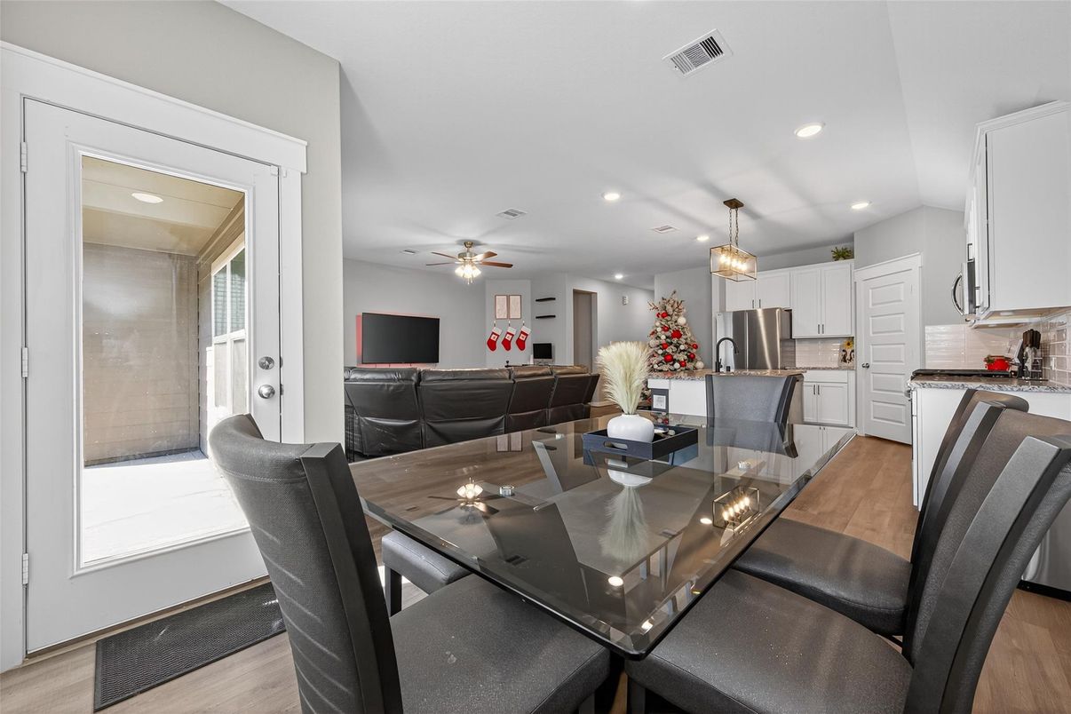 Dining room, Interior, Kitchen, Living room, Pendant Lights, Recessed Lighting, Stainless Steel Appliances, Wood Texture Flooring