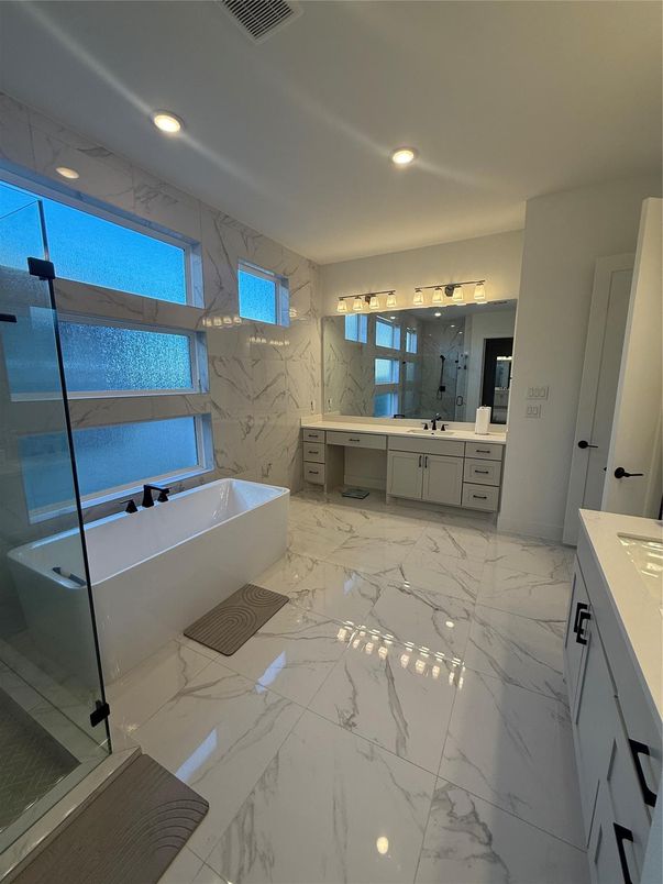Bathroom, Dual Sink Vanities, Free Standing Baths, Glass Shower, Interior, Marble, Marble Walls, Recessed Lighting