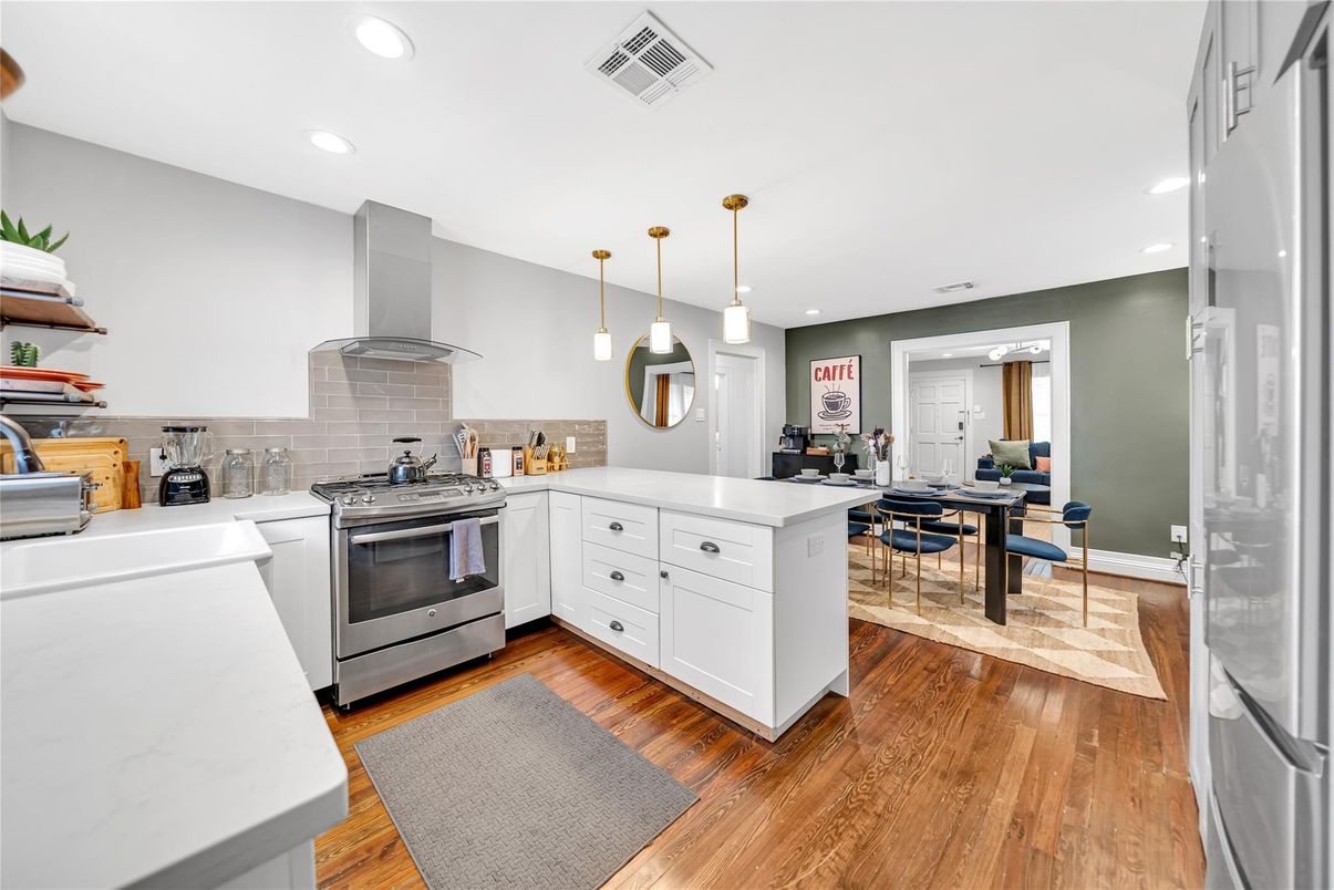 Dining room, Interior, Kitchen, Pendant Lights, Recessed Lighting, Stainless Steel Appliances, Wood Texture Flooring