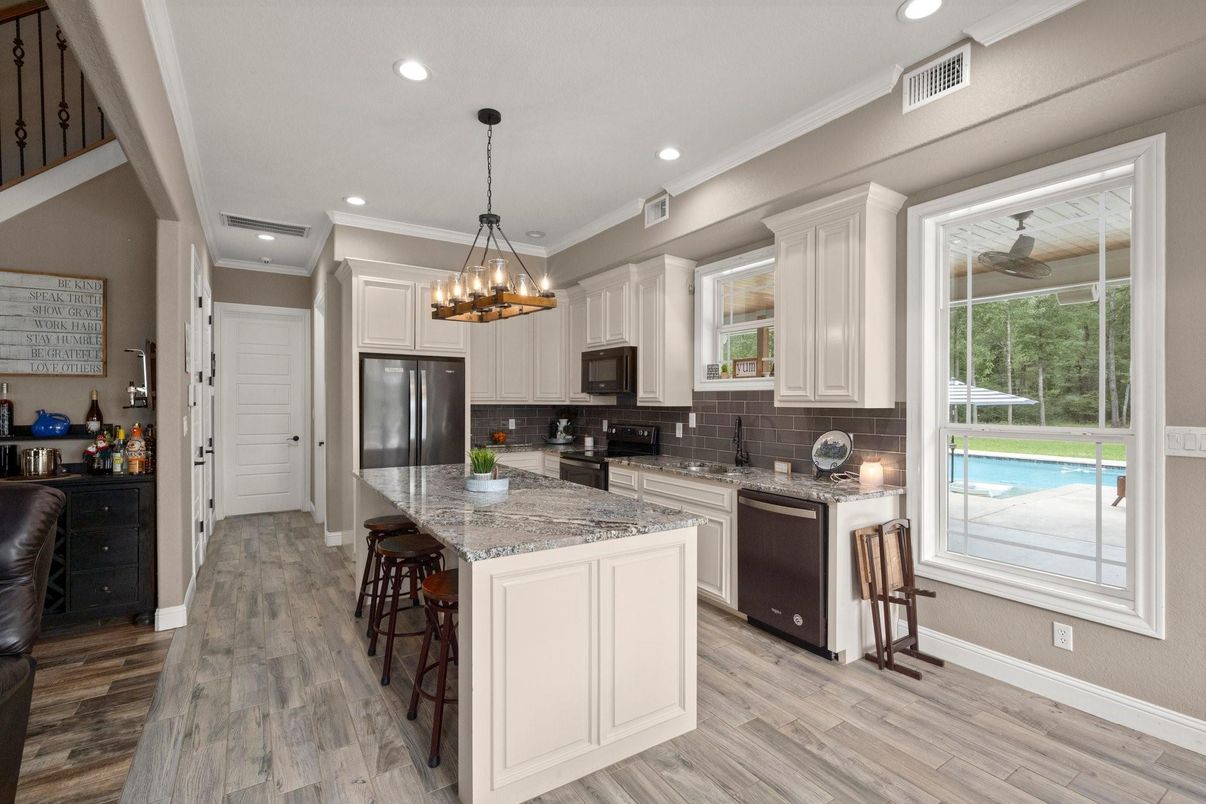 Chandelier, Interior, Kitchen, Pendant Lights, Recessed Lighting, Stainless Steel Appliances, Wood Texture Flooring