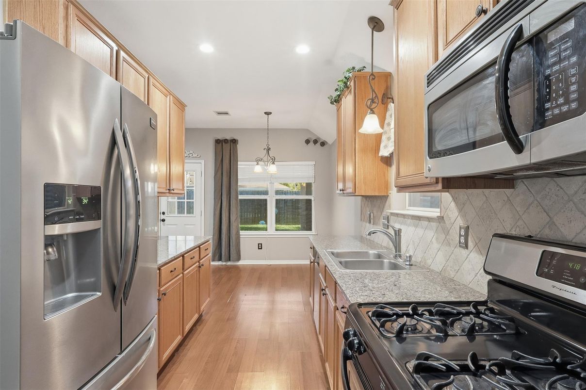 Interior, Kitchen, Pendant Lights, Recessed Lighting, Stainless Steel Appliances, Wood Texture Flooring