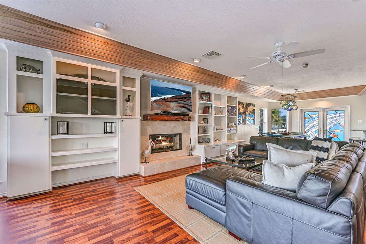 Fireplace, Interior, Living room, Pendant Lights, Recessed Lighting, Wood Texture Flooring, Wooden Walls