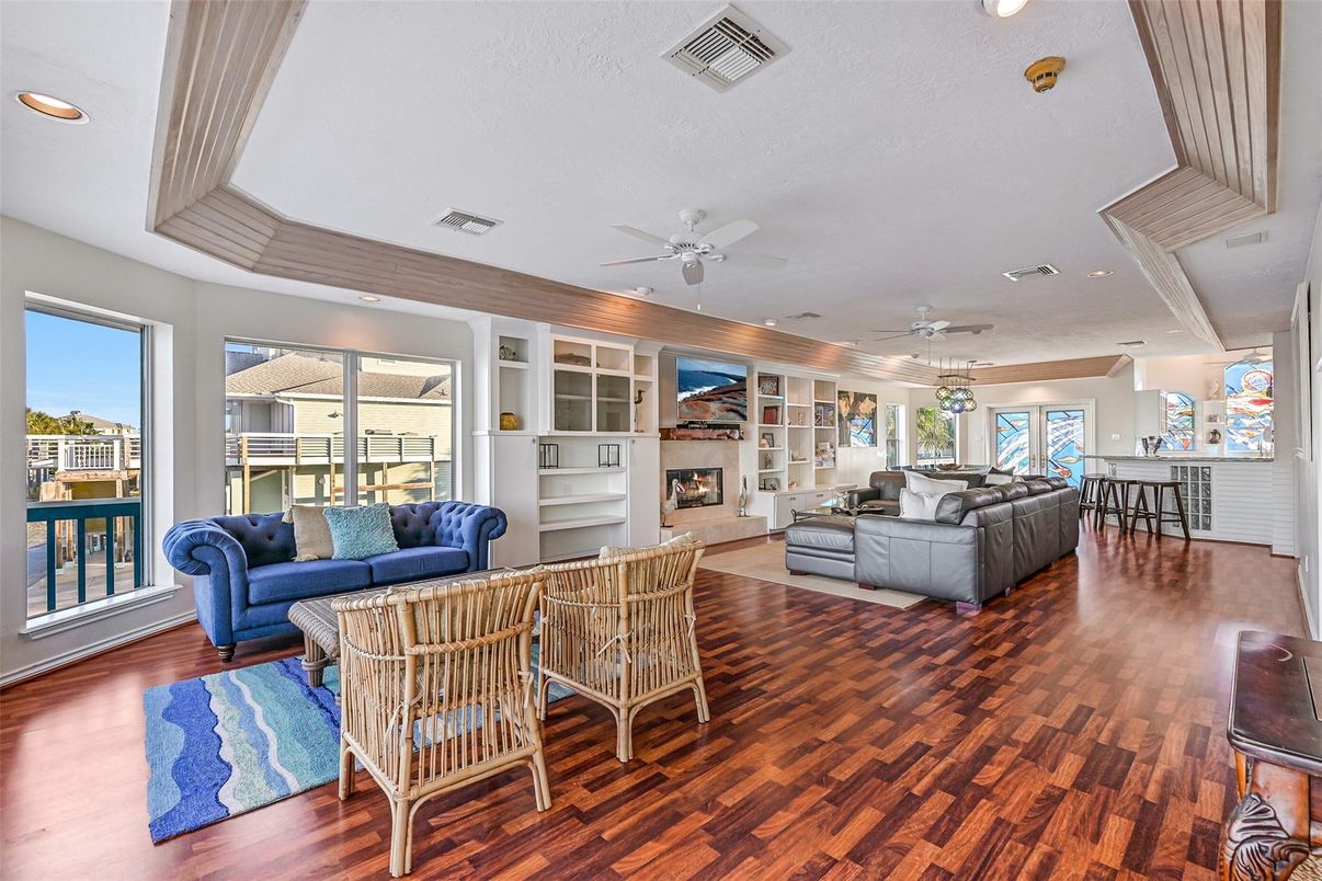 Dining room, Fireplace, Interior, Living room, Recessed Lighting, Wood Texture Flooring