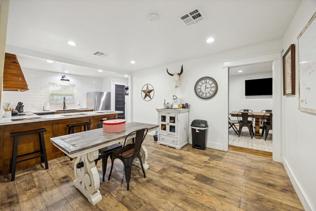 Dining room, Interior, Kitchen, Recessed Lighting, Stainless Steel Appliances, Wood Texture Flooring