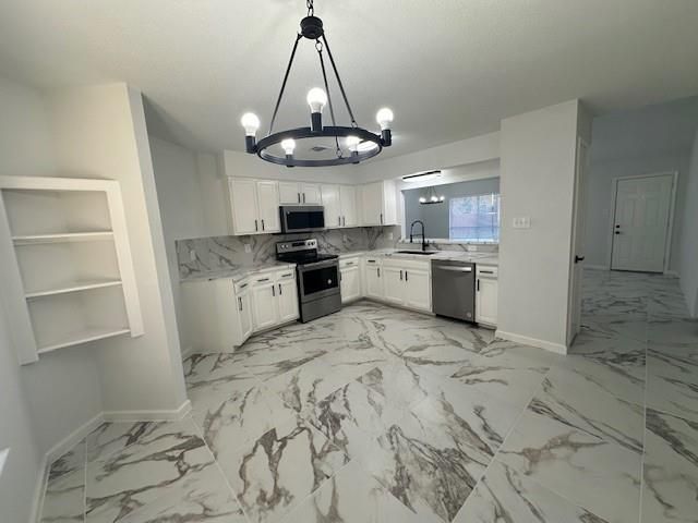 Chandelier, Interior, Kitchen, Marble, Marble Walls, Pendant Lights, Stainless Steel Appliances
