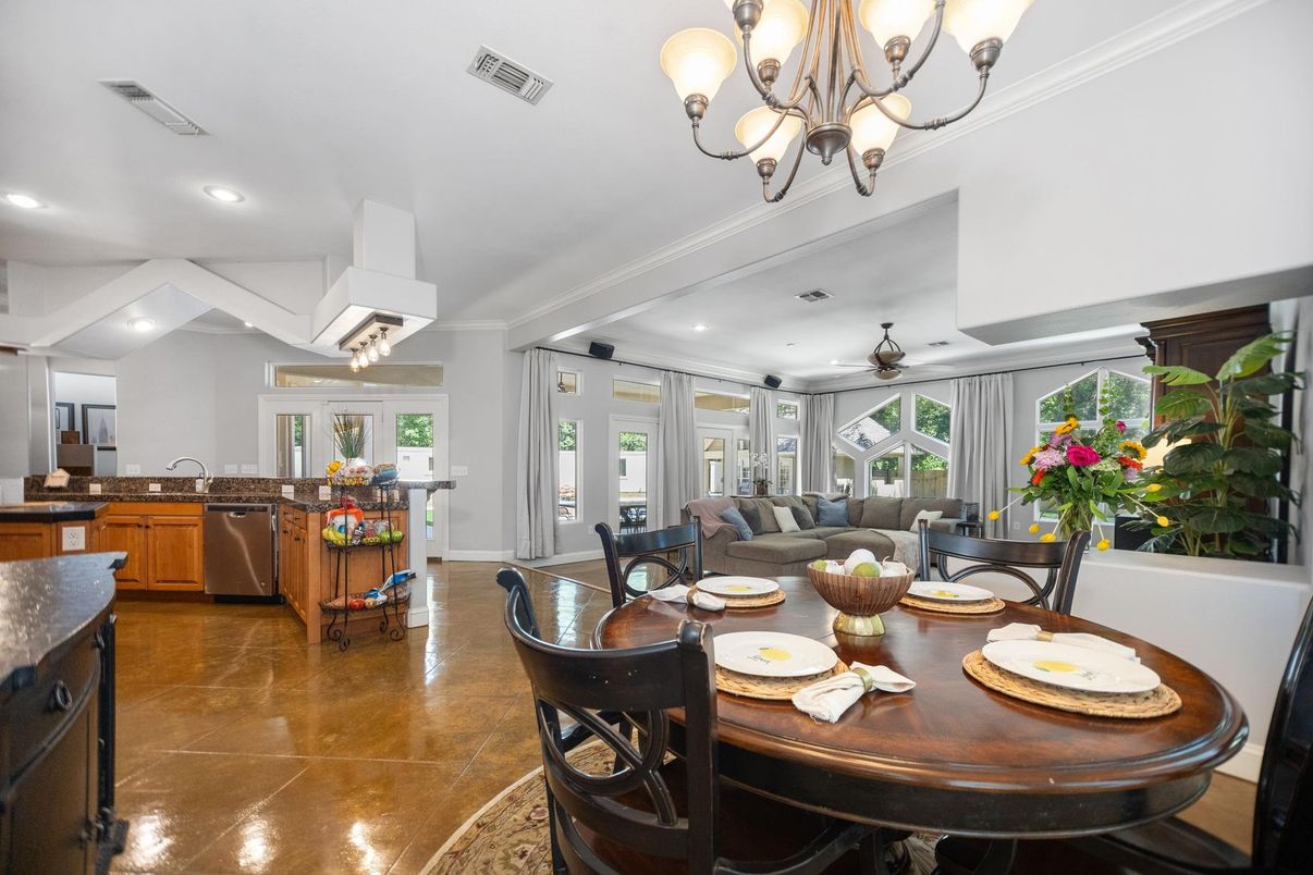 Chandelier, Dining room, Interior, Kitchen, Living room, Recessed Lighting, Stainless Steel Appliances