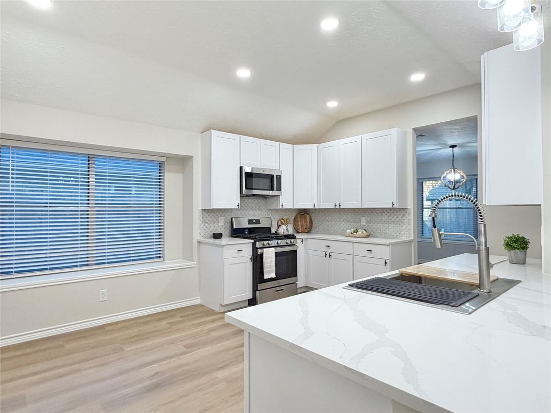 Interior, Kitchen, Pendant Lights, Recessed Lighting, Stainless Steel Appliances, Wood Texture Flooring