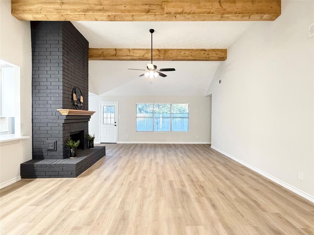 Empty room, Fireplace, Interior, Stone Walls, Wooden Beams, Wood Texture Flooring