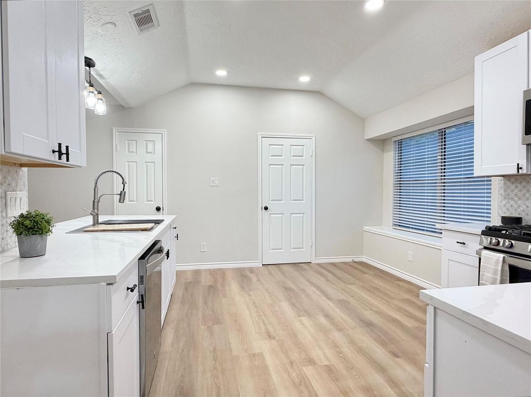 Interior, Kitchen, Recessed Lighting, Stainless Steel Appliances, Wood Texture Flooring