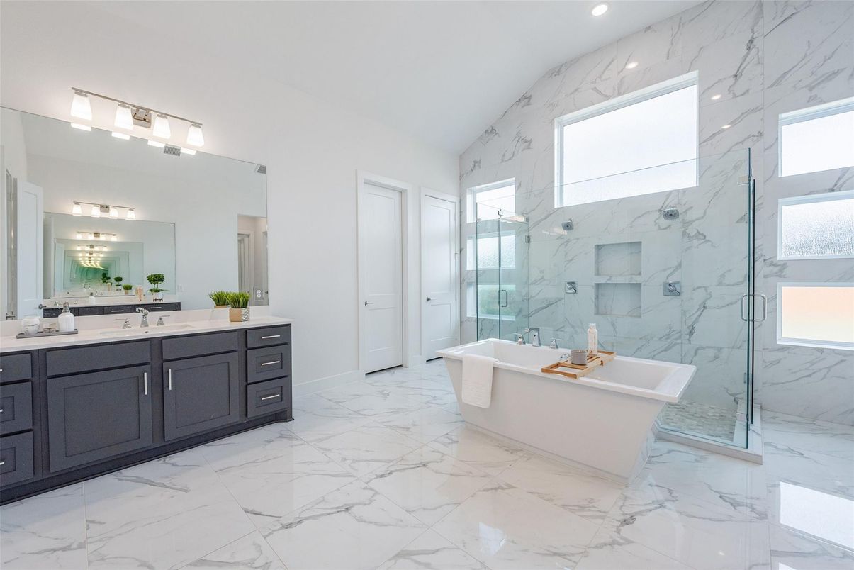 Bathroom, Dual Sink Vanities, Free Standing Baths, Glass Shower, Interior, Marble, Marble Walls, Recessed Lighting