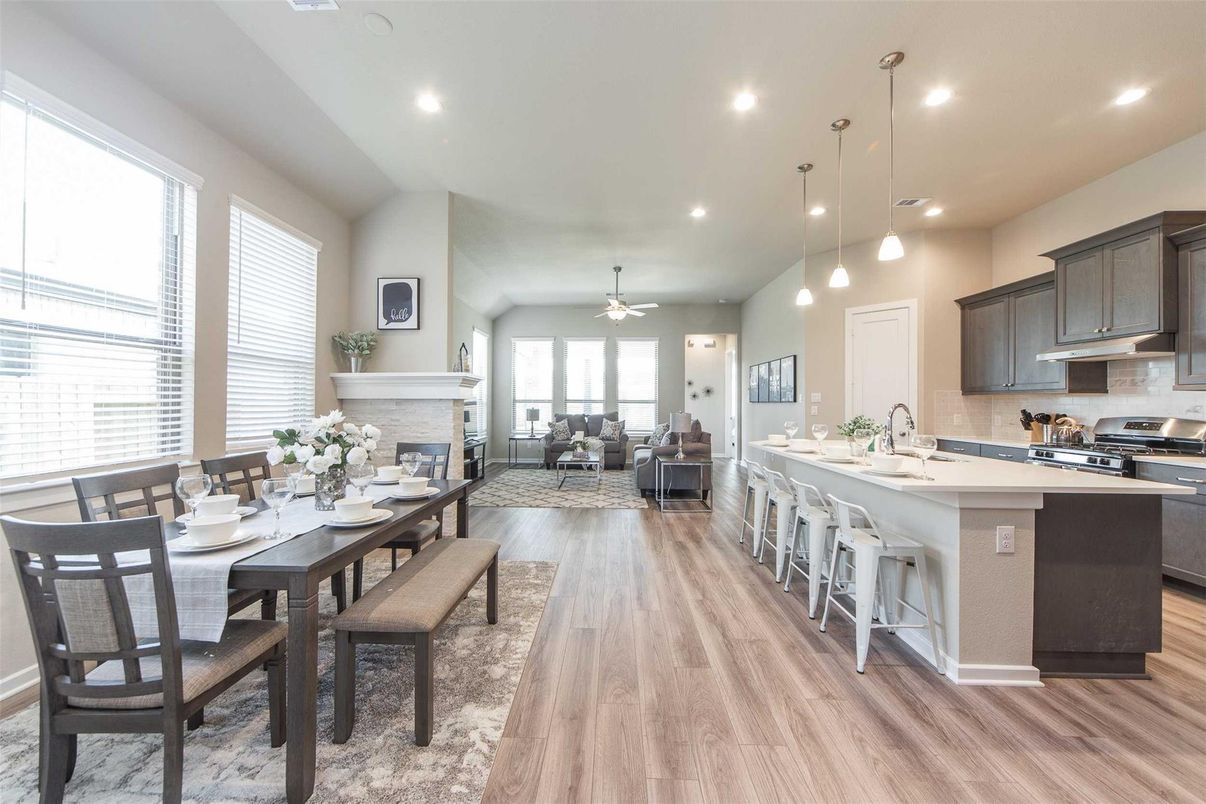 Dining room, Fireplace, Interior, Kitchen, Living room, Pendant Lights, Recessed Lighting, Stainless Steel Appliances, Wood Texture Flooring