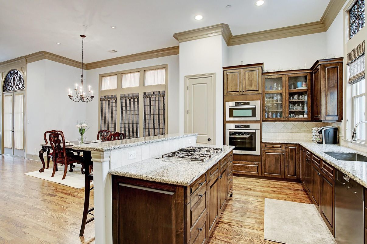 Chandelier, Dining room, Interior, Kitchen, Recessed Lighting, Stainless Steel Appliances, Wood Texture Flooring