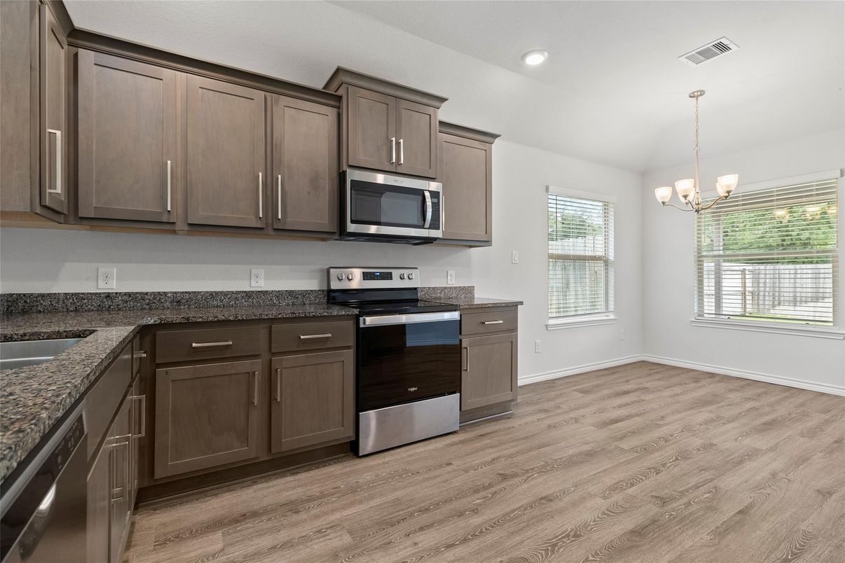 Chandelier, Interior, Kitchen, Pendant Lights, Recessed Lighting, Stainless Steel Appliances, Wood Texture Flooring