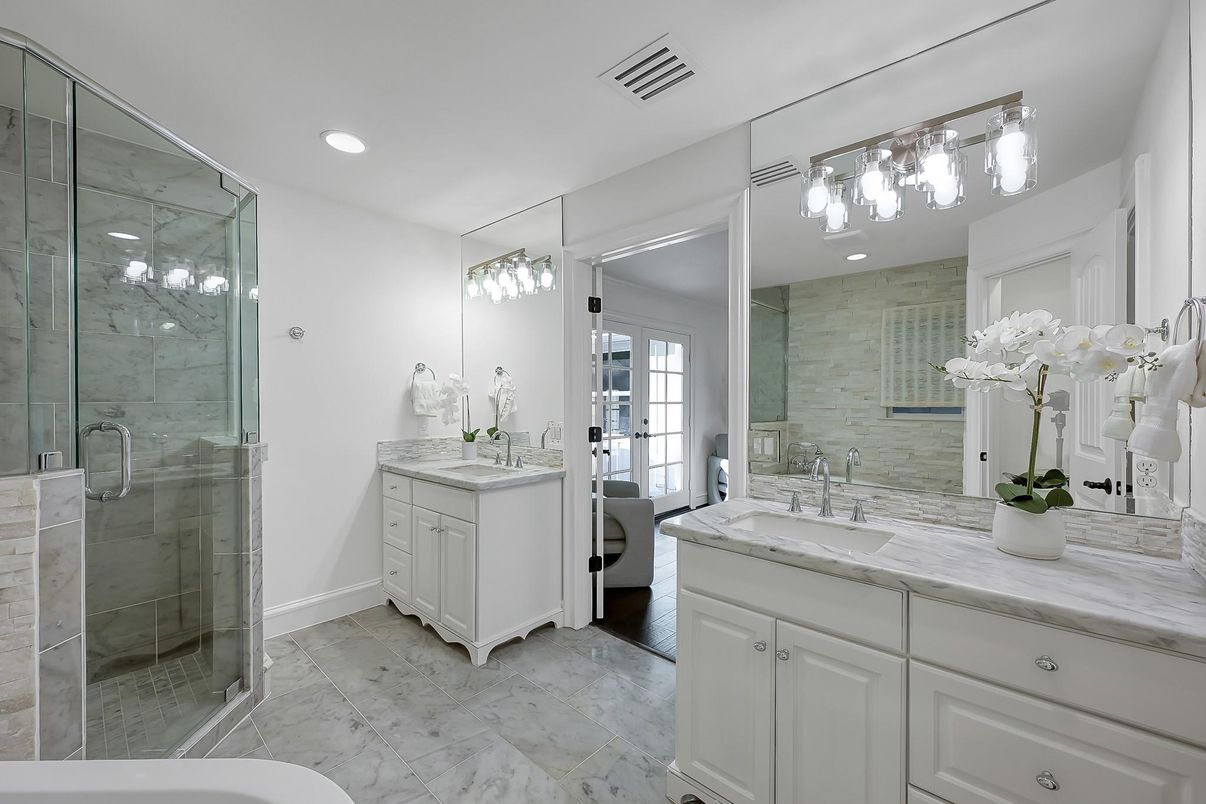 Bathroom, Dual Sink Vanities, Glass Shower, Interior, Marble, Marble Walls, Recessed Lighting