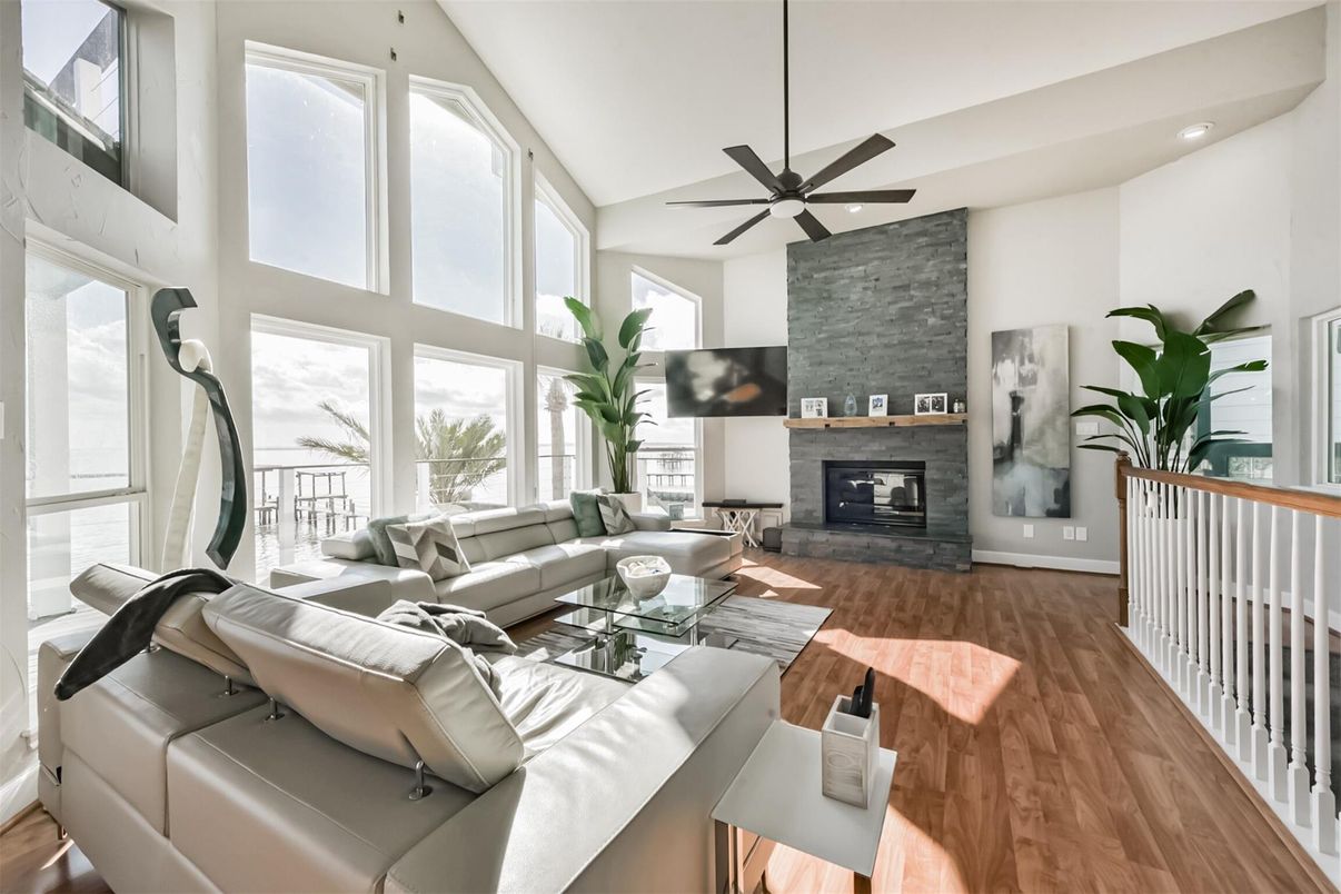 Fireplace, Interior, Living room, Recessed Lighting, Stone Walls, Wood Texture Flooring