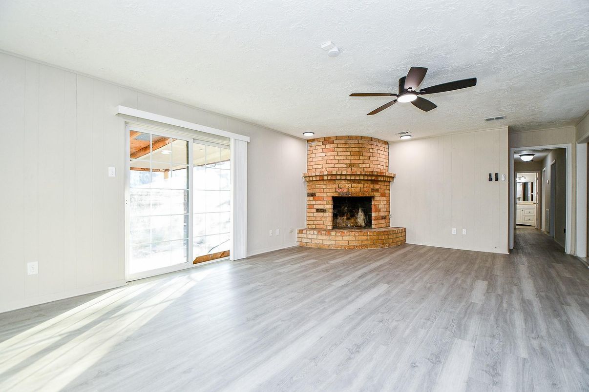 Empty room, Fireplace, Interior, Recessed Lighting, Wood Texture Flooring
