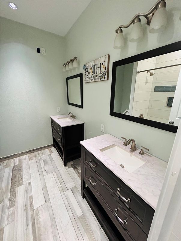 Bathroom, Dual Sink Vanities, Interior, Recessed Lighting, Wood Texture Flooring