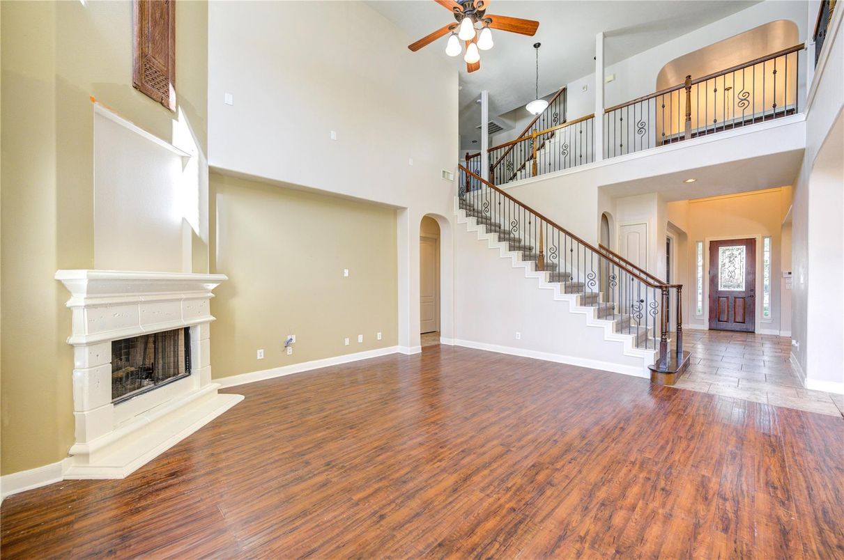 Fireplace, Interior, Pendant Lights, Recessed Lighting, Wood Texture Flooring