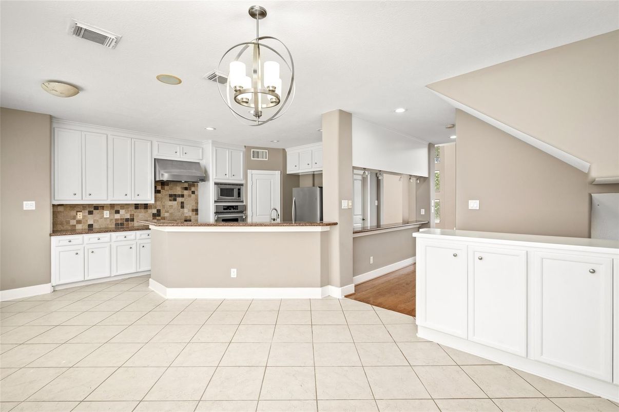 Chandelier, Interior, Kitchen, Pendant Lights, Recessed Lighting, Stainless Steel Appliances, Wood Texture Flooring