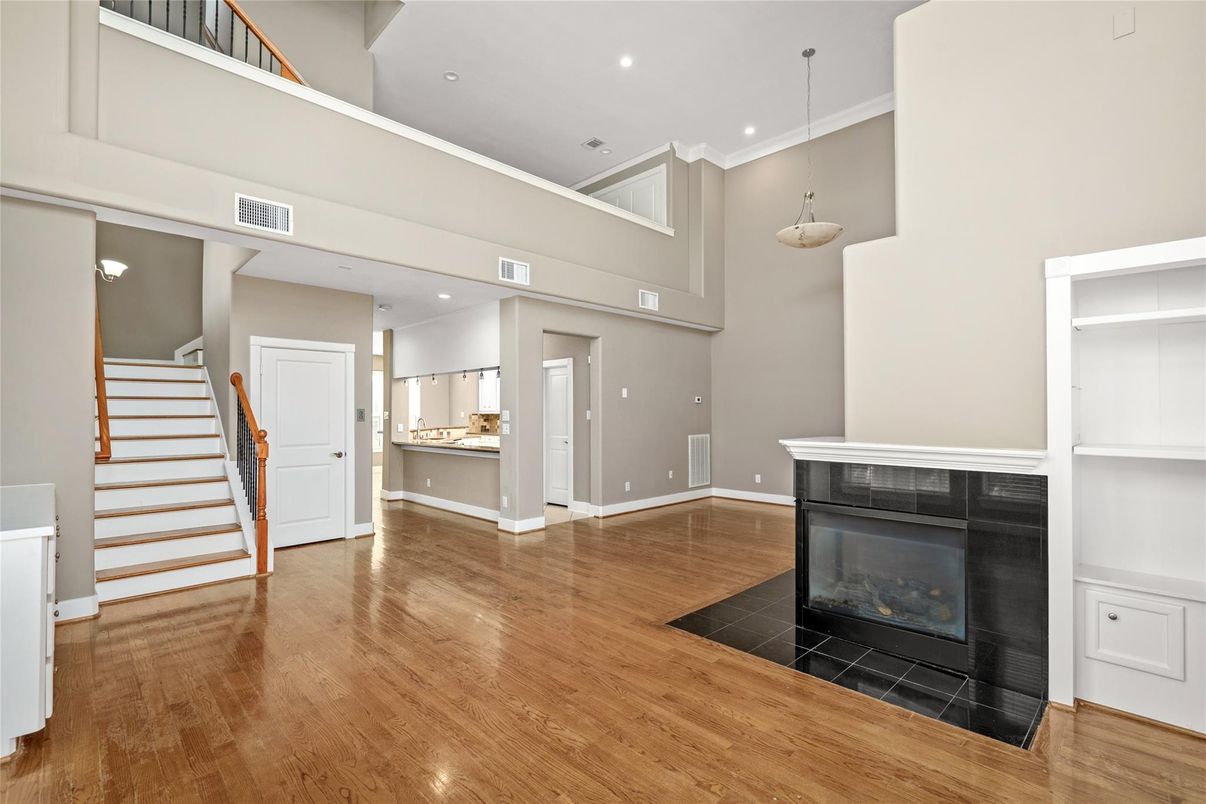 Fireplace, Interior, Pendant Lights, Recessed Lighting, Wood Texture Flooring