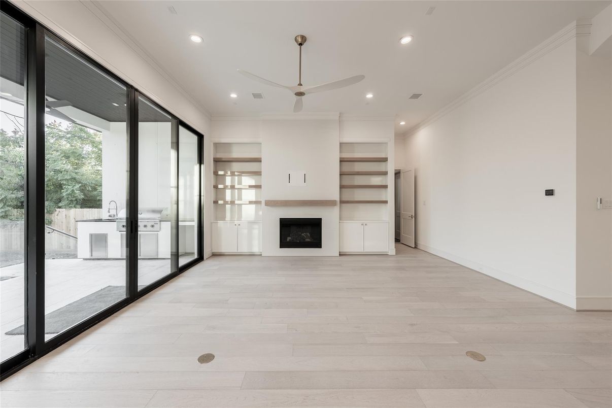 Empty room, Fireplace, Interior, Recessed Lighting, Wood Texture Flooring
