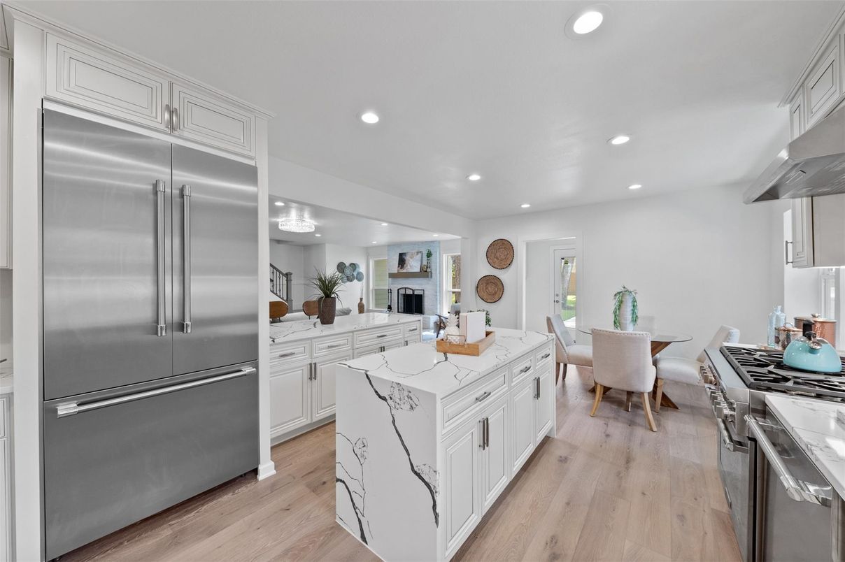 Dining room, Interior, Kitchen, Recessed Lighting, Stainless Steel Appliances, Wood Texture Flooring