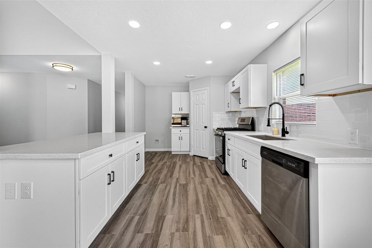 Interior, Kitchen, Recessed Lighting, Stainless Steel Appliances, Wood Texture Flooring