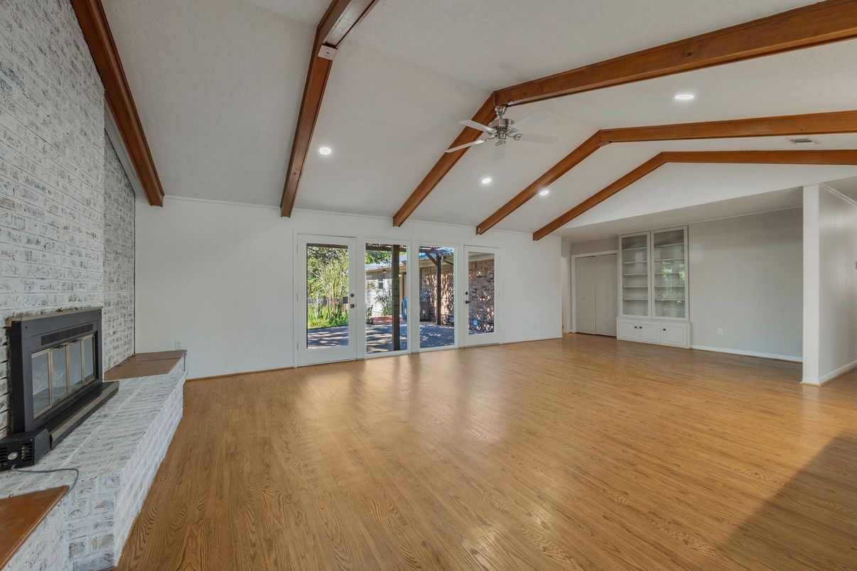 Empty room, Fireplace, Interior, Recessed Lighting, Wooden Beams, Wood Texture Flooring