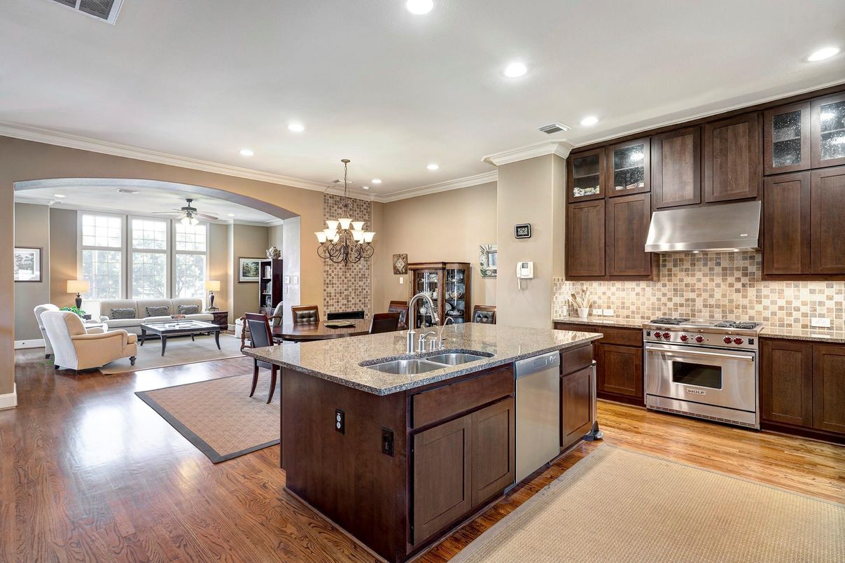 Chandelier, Dining room, Interior, Kitchen, Living room, Recessed Lighting, Stainless Steel Appliances, Wood Texture Flooring