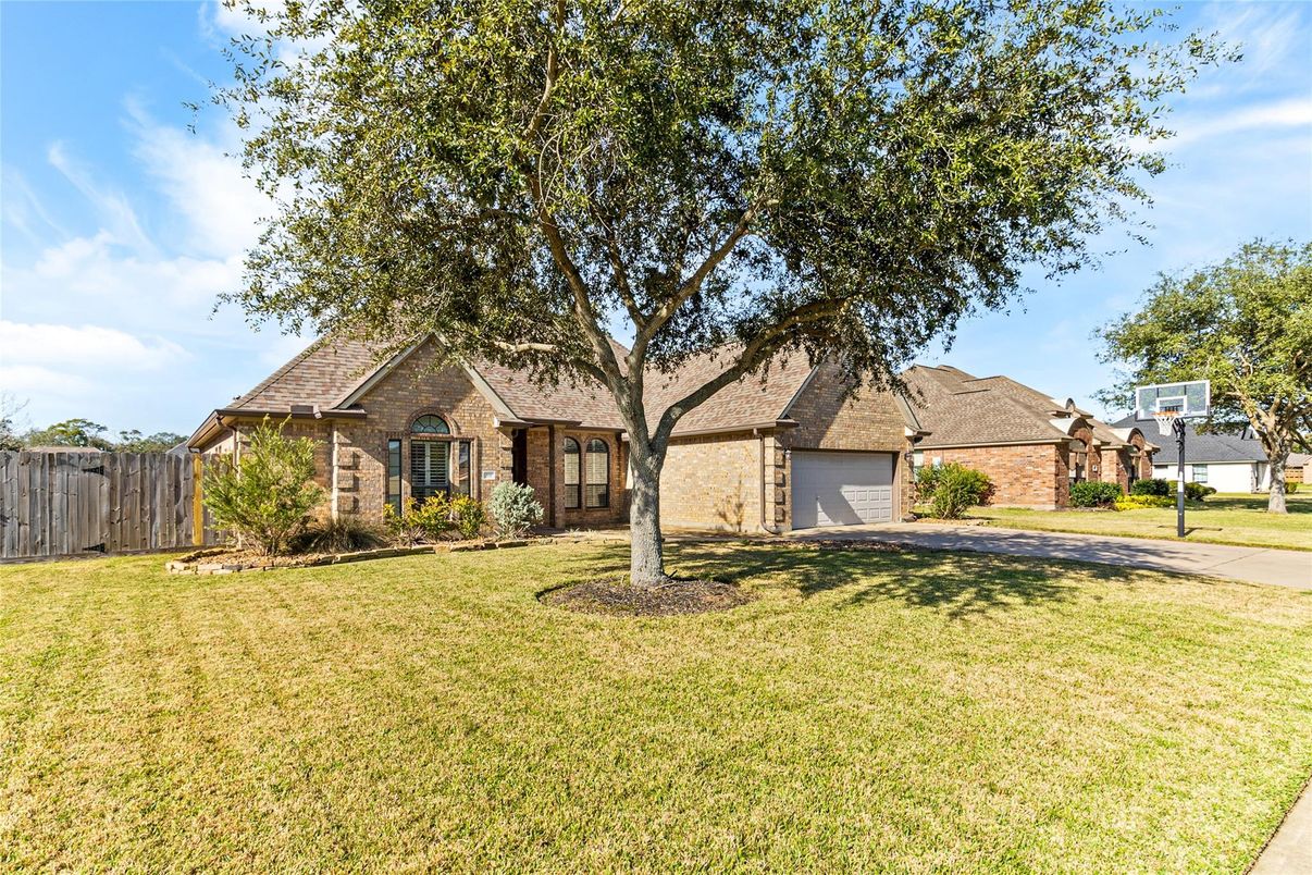 Attached, Backyard, Exterior, Facade, Brick Facade, Brick Traditional