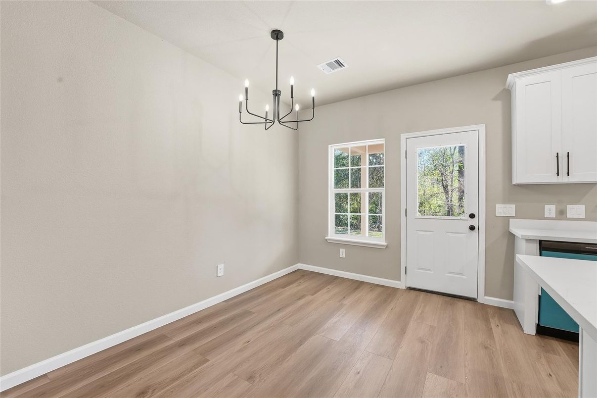 Chandelier, Empty room, Fireplace, Interior, Pendant Lights, Wood Texture Flooring