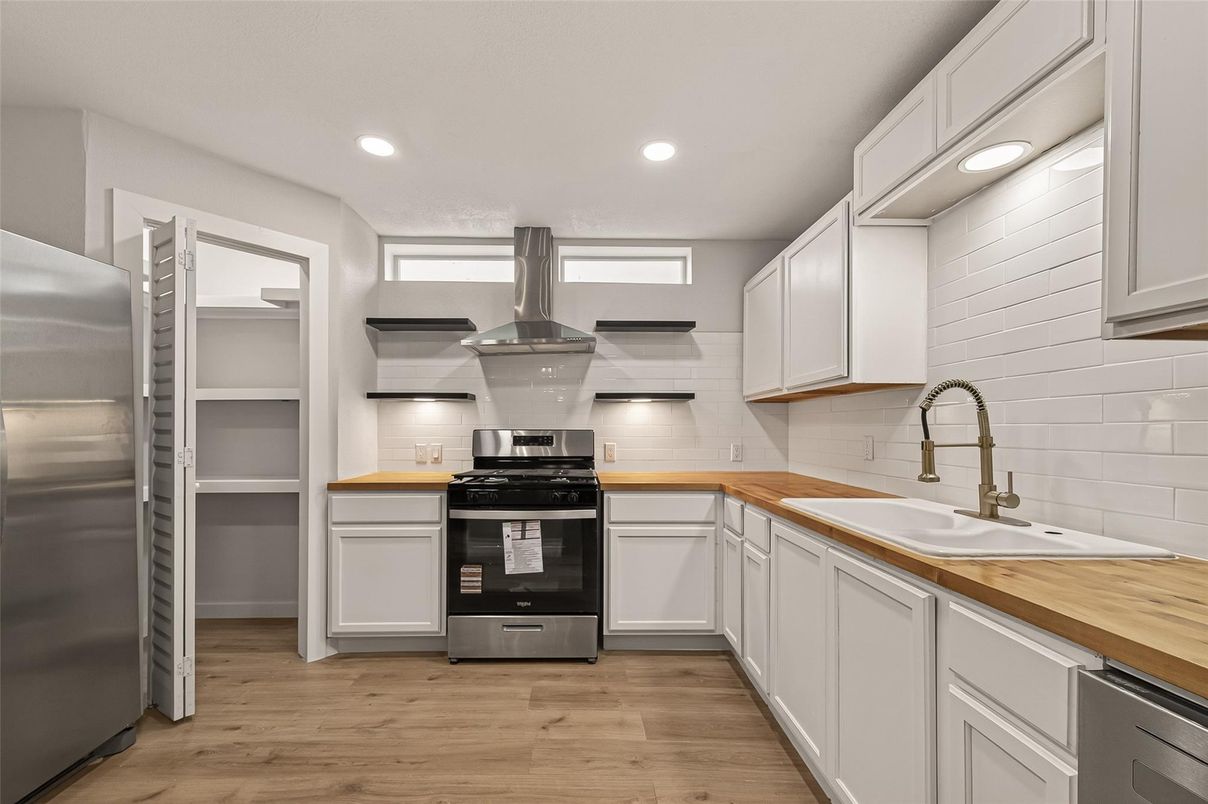 Interior, Kitchen, Recessed Lighting, Stainless Steel Appliances, Wood Texture Flooring