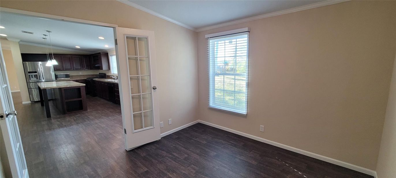 Empty room, Interior, Kitchen, Pendant Lights, Recessed Lighting, Stainless Steel Appliances, Wood Texture Flooring