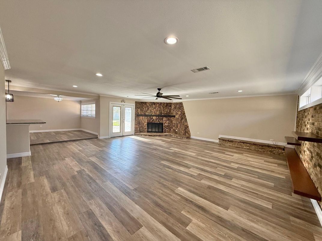 Empty room, Fireplace, Interior, Recessed Lighting, Wood Texture Flooring