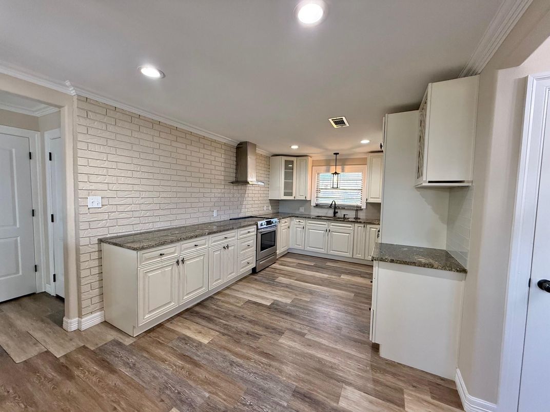 Interior, Kitchen, Pendant Lights, Recessed Lighting, Stainless Steel Appliances, Stone Walls, Wood Texture Flooring