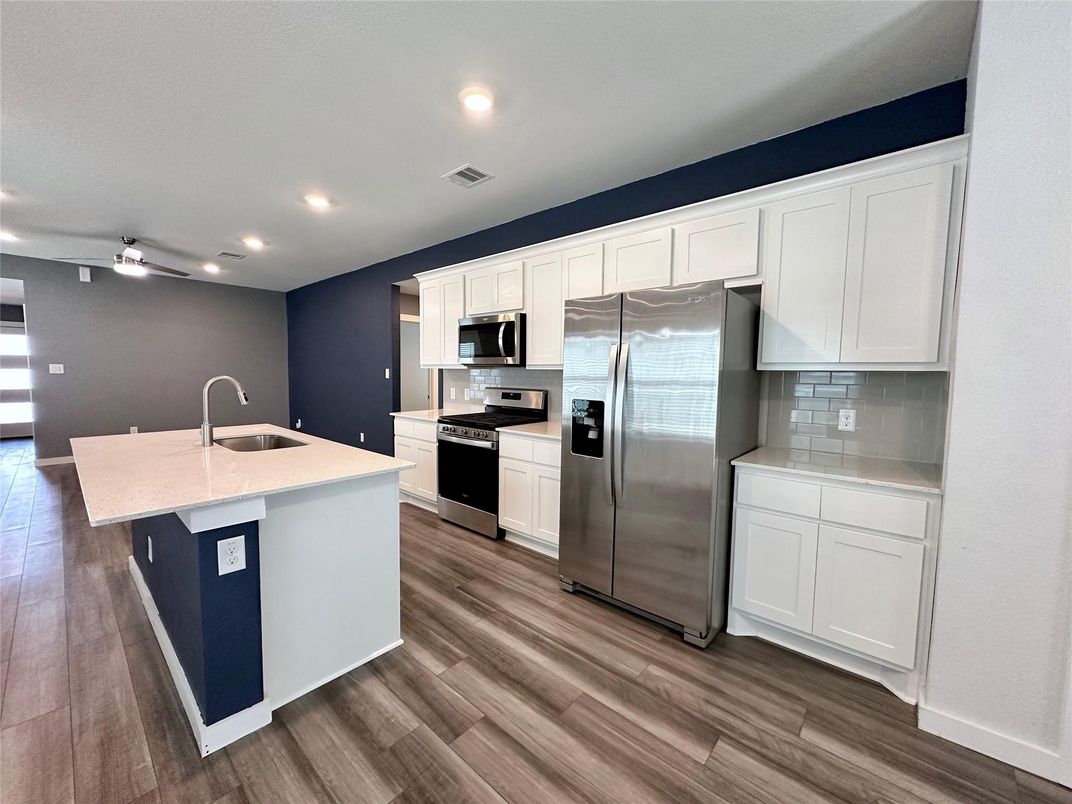 Interior, Kitchen, Recessed Lighting, Stainless Steel Appliances, Wood Texture Flooring