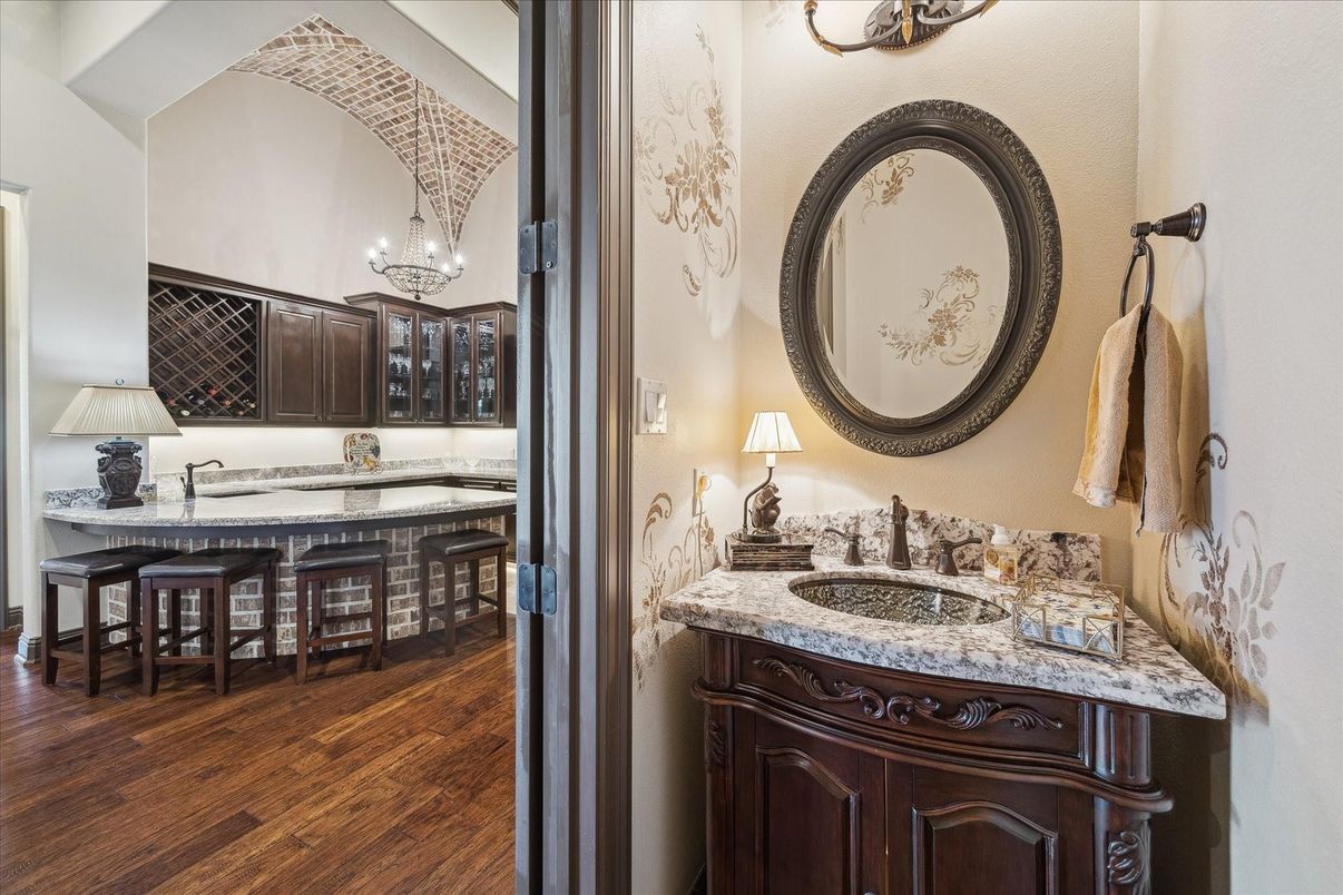 Bathroom, Chandelier, Dual Sink Vanities, Interior, Wood Texture Flooring