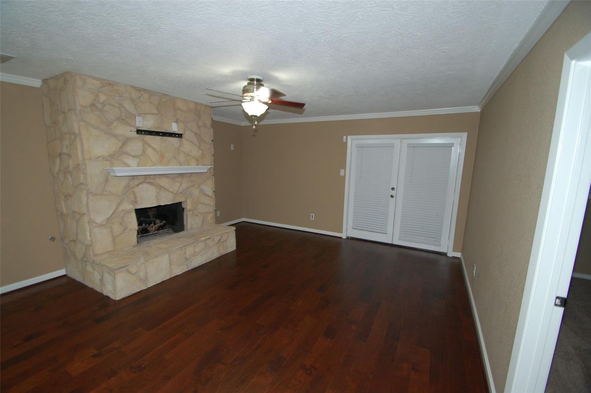 Empty room, Fireplace, Interior, Stone Walls, Wood Texture Flooring