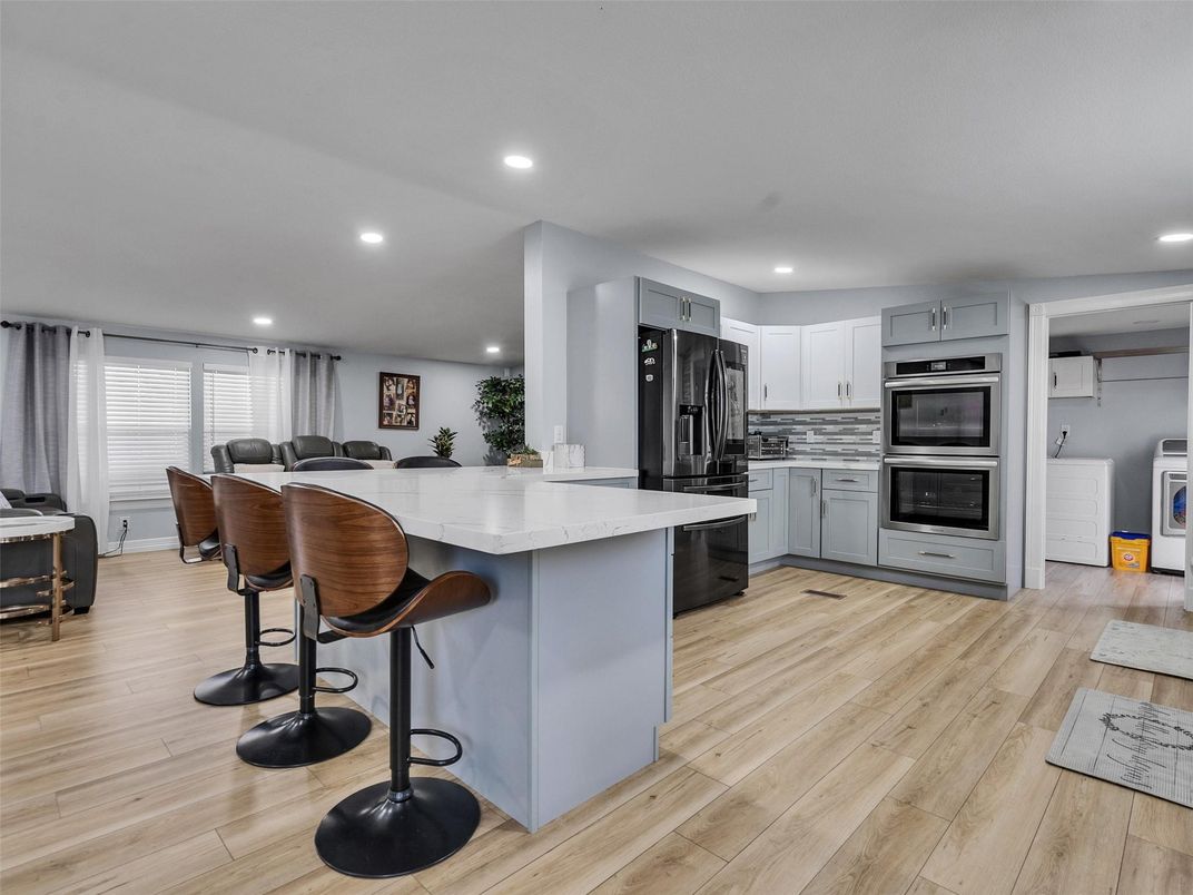 Interior, Kitchen, Recessed Lighting, Stainless Steel Appliances, Wood Texture Flooring
