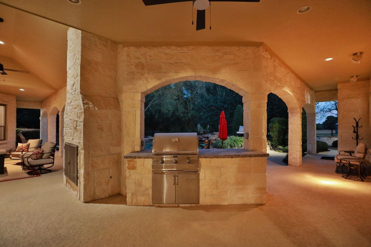 Exterior, Fireplace, Outdoor Kitchen, Recessed Lighting, Stone Walls