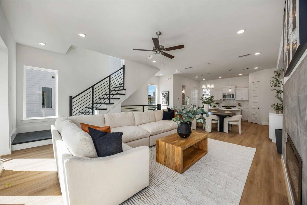 Chandelier, Dining room, Interior, Kitchen, Living room, Pendant Lights, Recessed Lighting, Stainless Steel Appliances, Wood Texture Flooring