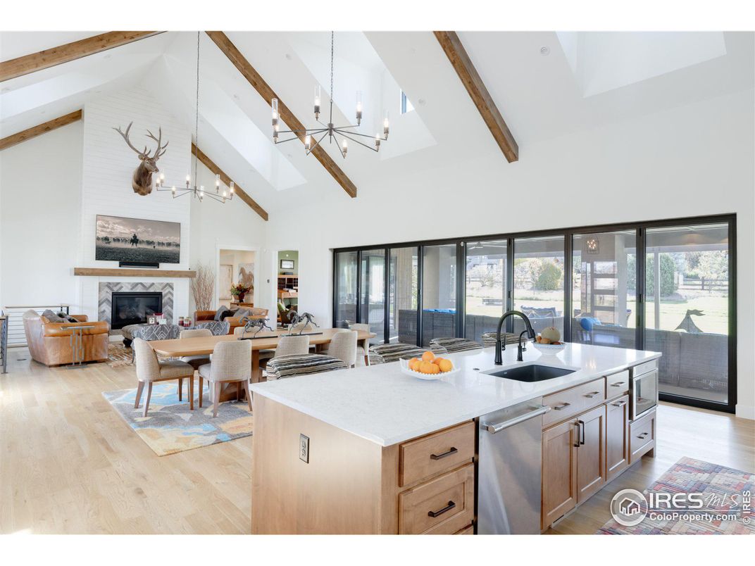 Dining room, Fireplace, Interior, Kitchen, Living room, Pendant Lights, Stainless Steel Appliances, Wooden Beams, Wood Texture Flooring
