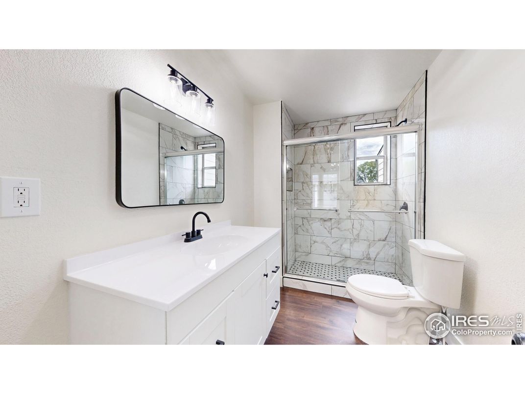 Bathroom, Glass Shower, Interior, Marble Walls, Wood Texture Flooring